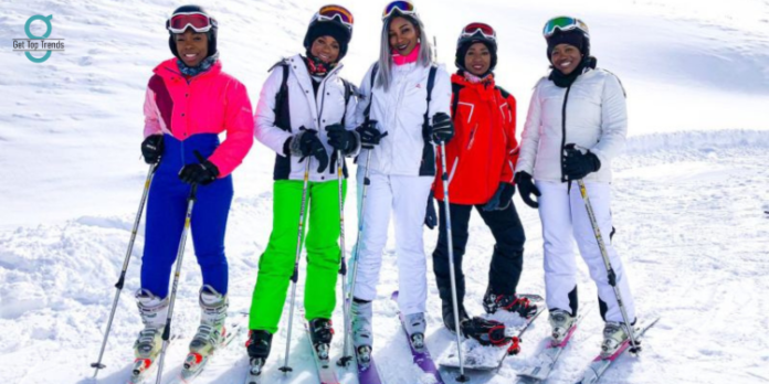 black skiers